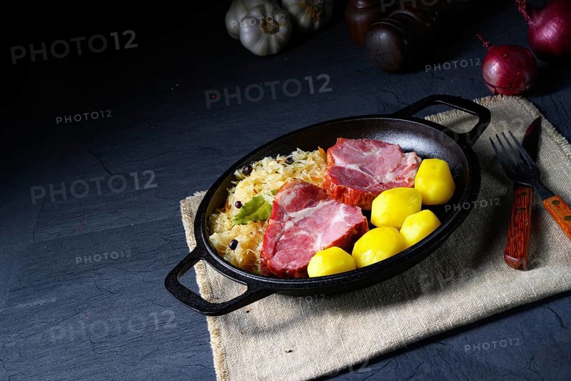 Cooked sauerkraut and delicious pork saddle