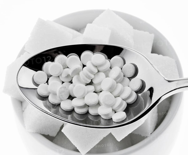 Low calorie sweetener and sugar cubes. Symbol for calories and diet, Austria