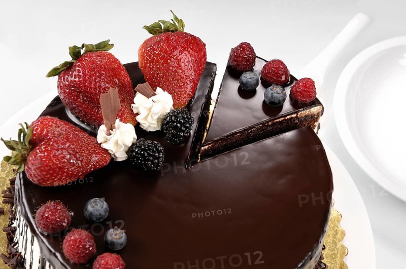 Chocolate cake with strawberries on a table