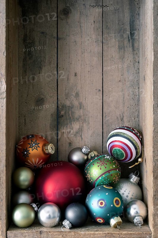 Christmas decoration glass balls in a wooden box background
