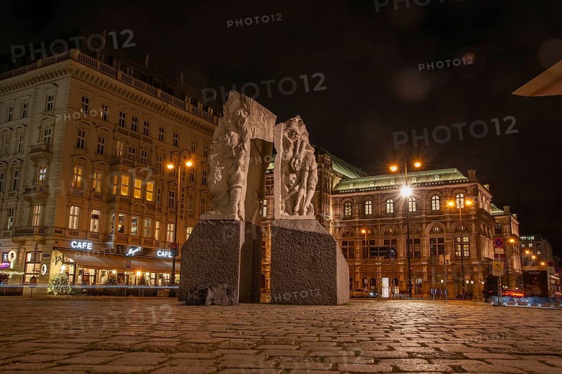 Memorial against war and fascism, monument by Alfred Hrdlicka, behind the opera, night shot, Vienna, Austria