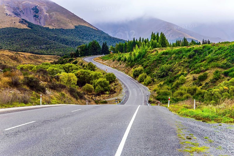 Picturesque road along the Pacific coast to Pancake Rock. West Coast of the South Island of New Zealand. Incredible journey to the ends of the world. The concept of ecological, active and photo tourism
