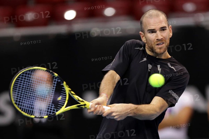 Sofia, Bulgaria - 12 November, 2020: France's Adrian Mannarino in action during his quarter-final match against Moldova's Radu Albot during the Sofia Open ATP 250 tennis tournament, Sofia, Bulgaria