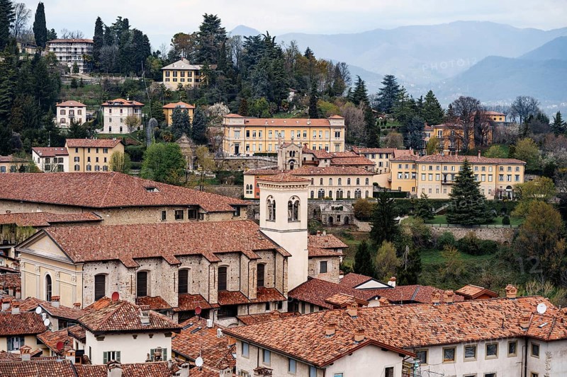 Red tiled roofs of old houses. Bergamo, Italy.