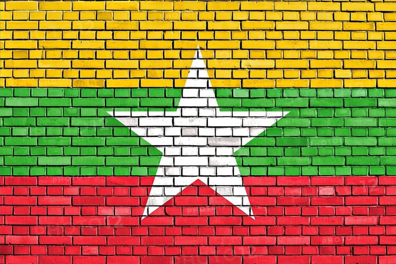 Flag of Myanmar painted on brick wall