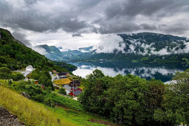 Beginning of the Hardangerfjord. Scenic road in the mountains of Western Norway. Scandinavia. Magical journey in the cold northern country. Summer