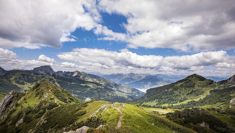 High angle panoramic view of the Julian alps in summer, as seen from passo Pramollo on the border between Italy and Austria. Mountain Landscape