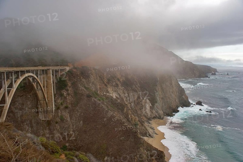Road along Pacific coast USA and the bridge above a precipice
