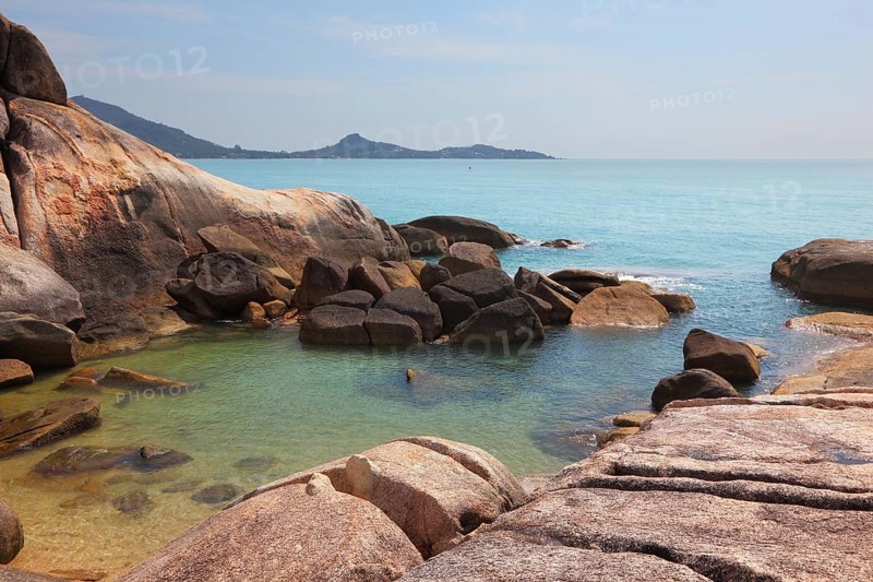 Beautifully shining cliffs on Lamai Beach Koh Samui