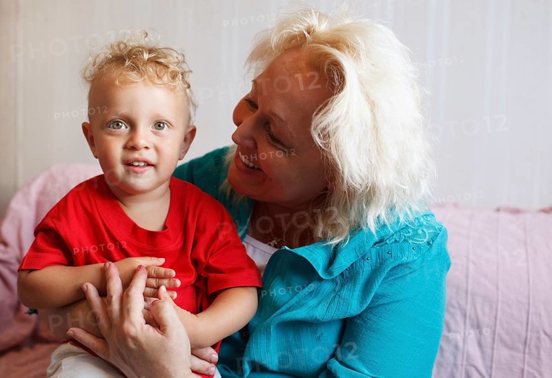 Happy grandmother with her little grandson