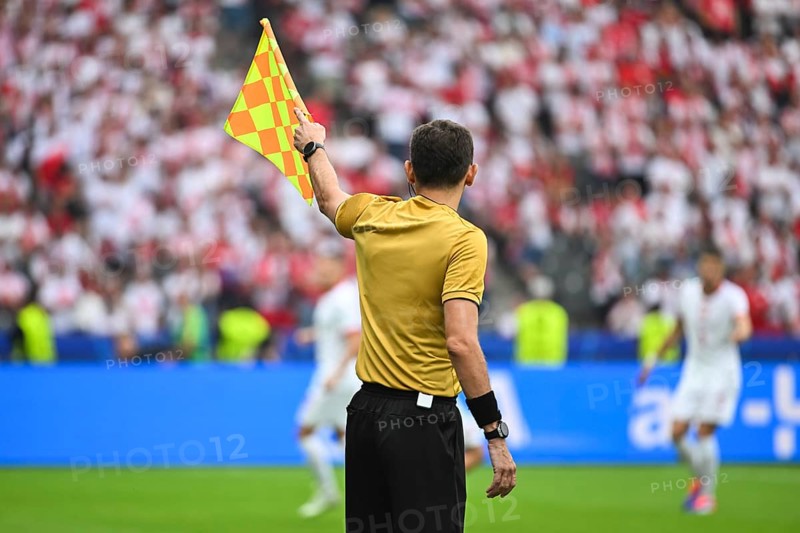Assistant of football referee during the match