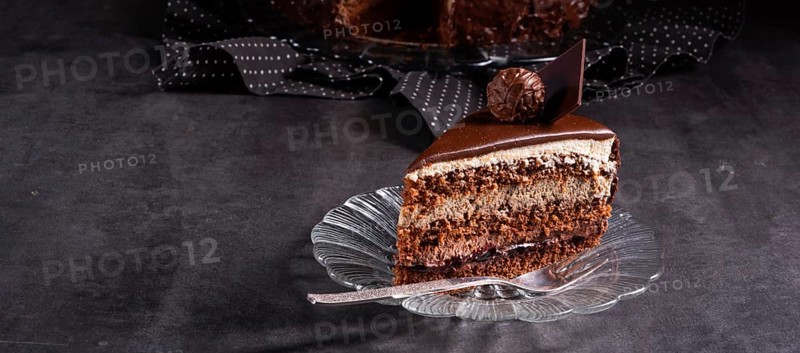Chocolate cake Airy biscuits and a cream of cream and chocolate