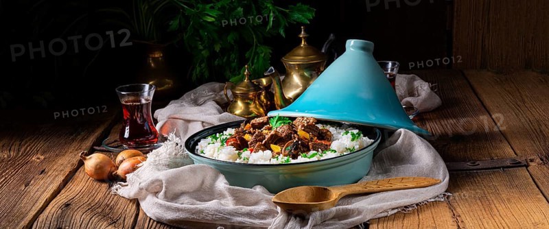 Tajin beef stew with rice, peppers and sesame seeds