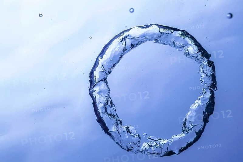 Underwater Bubble Ring Ascends towards the Sun