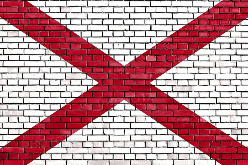 Flag of Alabama painted on brick wall