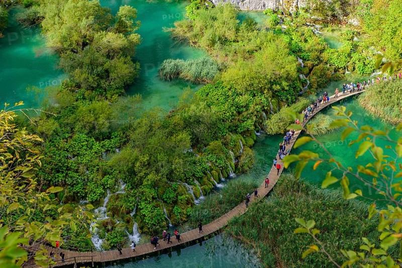 People walking on the trekking path at Plitvice Lakes National Park (Plitvi?ka Jezera), a national park in Croatia