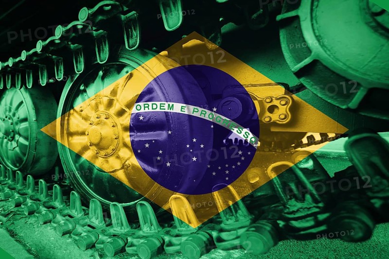 Military tank close-up Caterpillar Track with Brazil flag Background