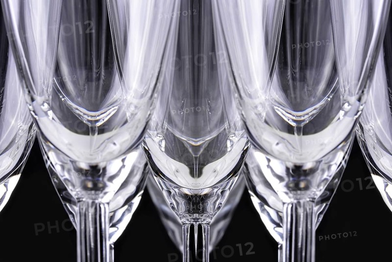 Champagne glasses in a black background