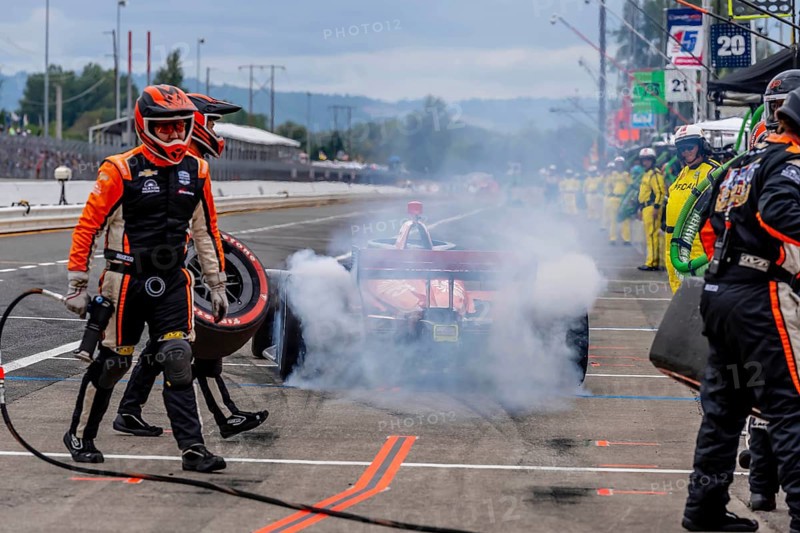 INDYCAR Series driver, BENJAMIN PEDERSEN (R) (55) of Copenhagen, Denmark, brings his car in for service during the Bitnile.com Grand Prix of Portland at Portland International Raceway in Portland OR