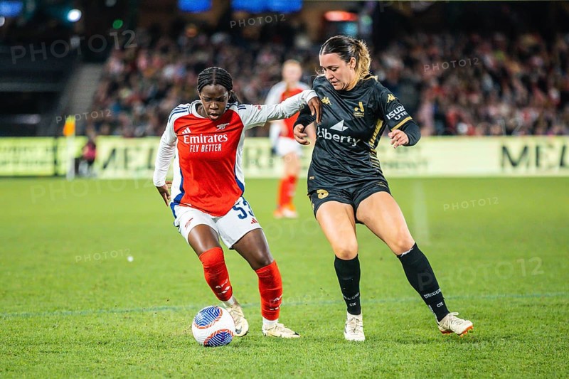 MELBOURNE, AUSTRALIA, MAY 24: Vivienne Lia of Arsenal Women FC competes against Michaela Foster of A-League All Stars Women team during the Global Football Week at Marvel Stadium on May 24, 2024 in Melbourne, Australia