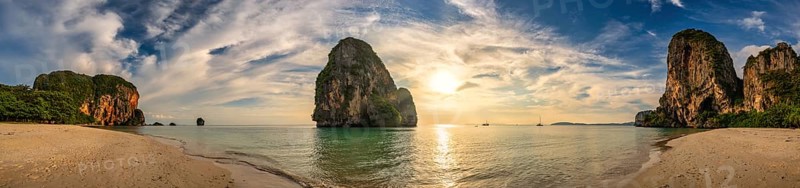 Tropical islands sunset view with ocean sea water at Phra Nang Cave Beach, Krabi Thailand nature landscape panorama