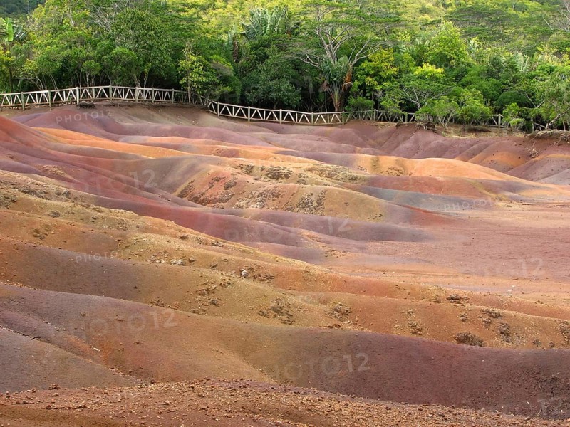 Earth that shines strangely in different colours, it is of volcanic origin, and the colour results from the erosion of the exposed old volcanic ash. A strange natural phenomenon of the coloured earth of Chamarel, Mauritius
