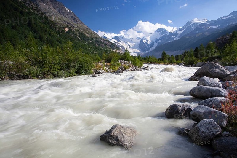 Swiss mountain landscape of the Morteratsch Glacier Valley hiking trail in the Bernina Mountain Range