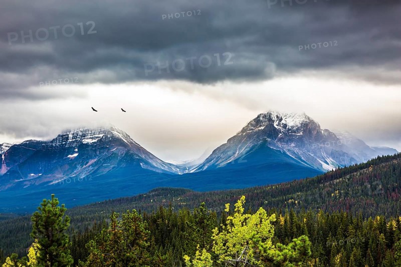 The concept of active tourism. The astonishing nature of the Rockies of Canada. The snow-capped mountains