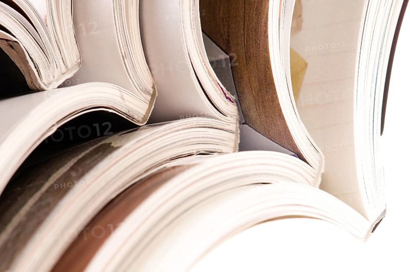 Stack of open magazines