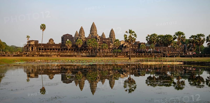 Panoramic scenery of angkor wat complex reflected on lake in the morning. Siem reap Campodia Asia