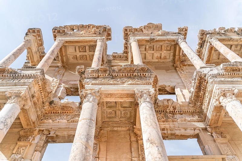 Celsus Library in Ephesus in Selcuk (Izmir), Turkey. Marble statue is Sophia, Goddess of Wisdom, at the Celcus Library at Ephesus, Turkey. The ruins of the ancient antique city