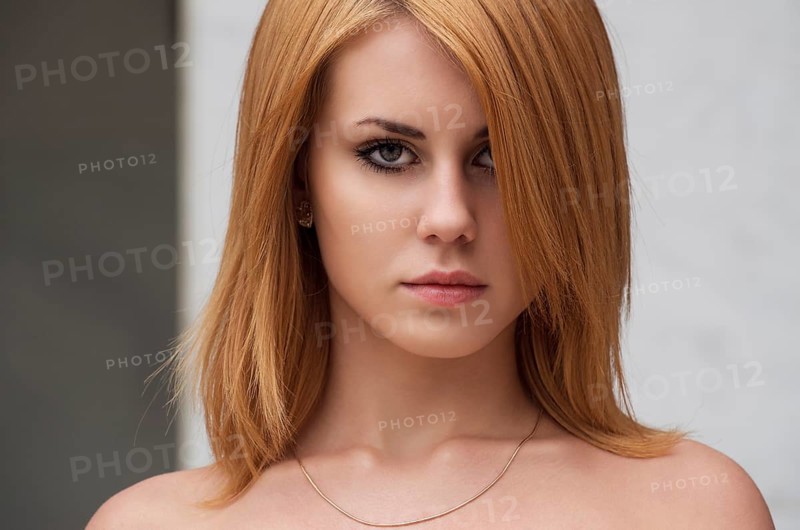 Attractive young caucasian woman in white short dress