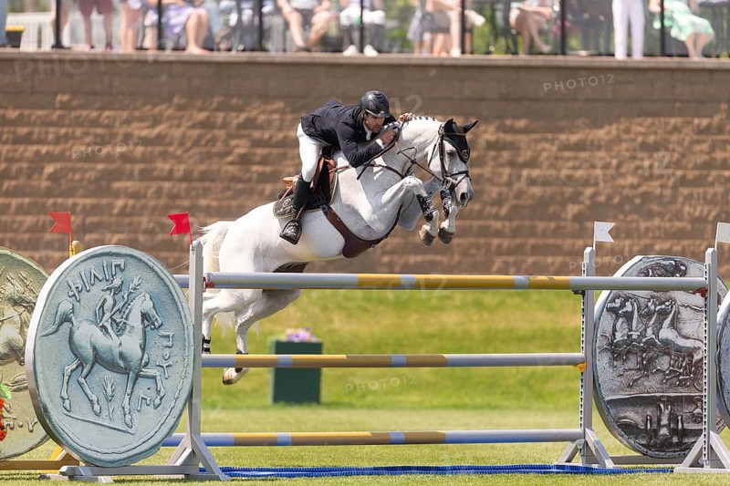 Eugenio Garza Perez of Mexico and riding Contago, compete in the 1.60m Grand Prix during The Continental international competition at Spruce Meadows, in Calgary, Canada, North America
