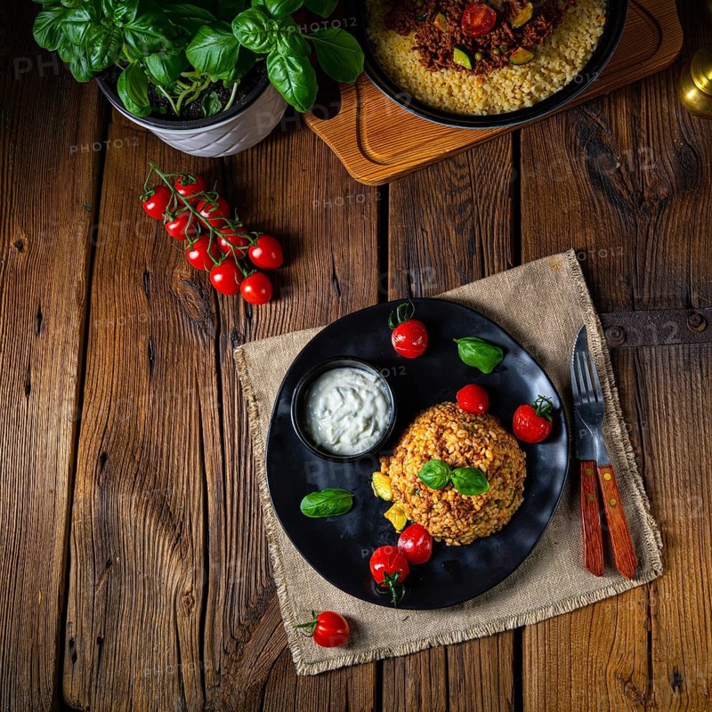 Rustic wulgur fried with minced meat and vegetables