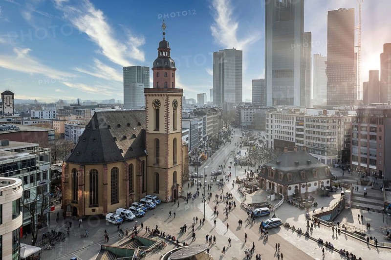 Frankfurt city centre near Hauptwache with St. Catherine's Church, skyline in the background at sunset
