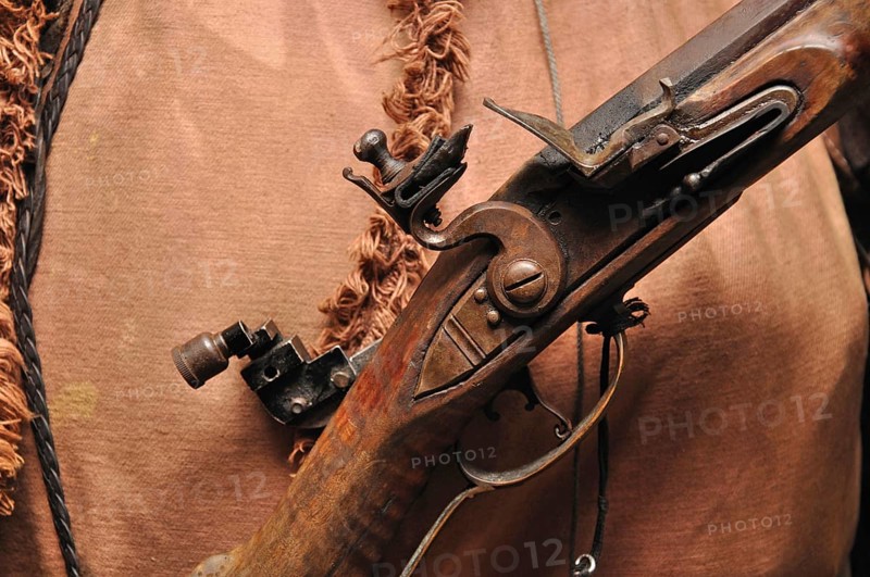 Mechanism of a blackpowder flintlock rifle