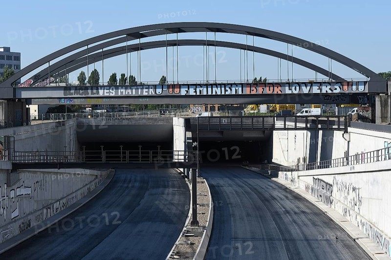 Construction site of the A100 motorway at the connection to Sonnenallee near the Estrel Hotel in Berlin-Neukölln. The lettering on the railway bridge reads Black lives matter Feminism is for lovers
