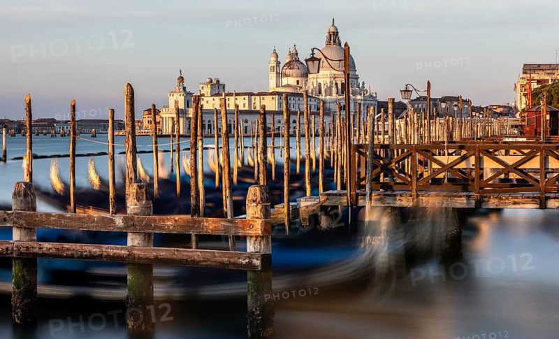 Gondola jetty, Venetian gondolas with the church of Santa Maria della Salute in the background, Venice, UNESCO World Heritage Site, Veneto, Italy