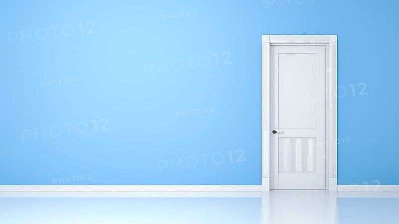 A wall and a door in an empty flat with space for your content