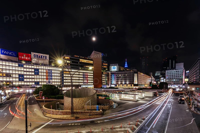 Shinjuku, Japan, 18 May 2019: Shinjuku station with bus terminal in Tokyo?s busy Shinjuku neighborhood at night