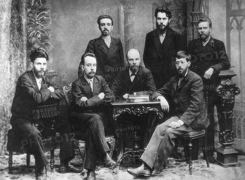 Julius Martov or L. Martov, real name Yuli Osipovich Zederbaum (November 24, 1873 – April 4, 1923) was born in Istanbul in 1873.<br/><br/> The son of Jewish middle class parents, he became the leader of the Mensheviks in early twentieth century Russia.<br/><br/> This image, taken by Nadezhda Konstantinovna Krupskaya (1869-1939) at St Petersburg in 1897, shows (left to right) standing: A.L. Malchenko, P. K. Zaporozhets, A. A. Vaneyev, and seated: V. V. Starkov, G. M. Krzhizhanovsky, V. I. Ulyanov (Lenin) and Julius Martov