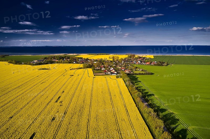 View of the Baltic Sea with the village of Wampen in the foreground