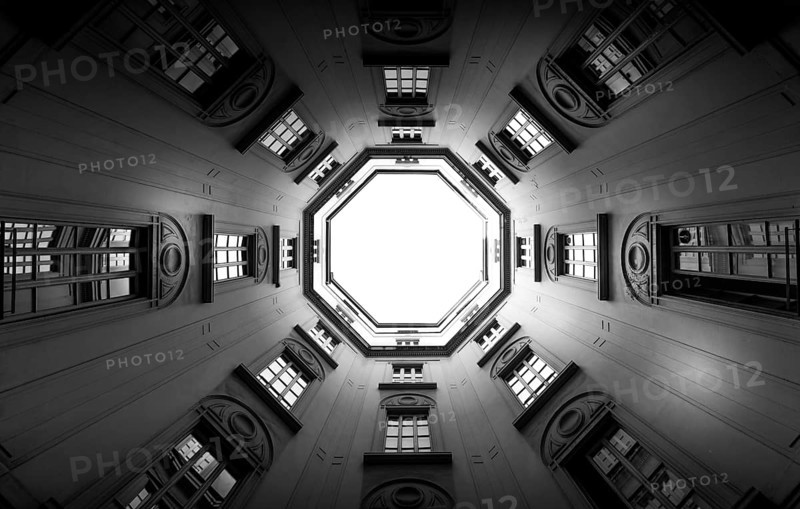 Italy, Milan. Interior of an old palace, looking to the sky with a wide 16mm lens