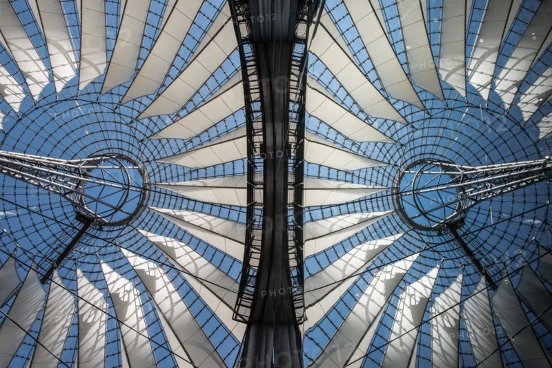 Roof of the Sony Center. Sony Centre, designed by Helmut Jahn, is an eye-catching monolith of glass and steel featuring an enormous tent-like conical roof, its shape reportedly inspired by Mount Fuji in Japan, covering an elliptical central public space up to 102 metres across