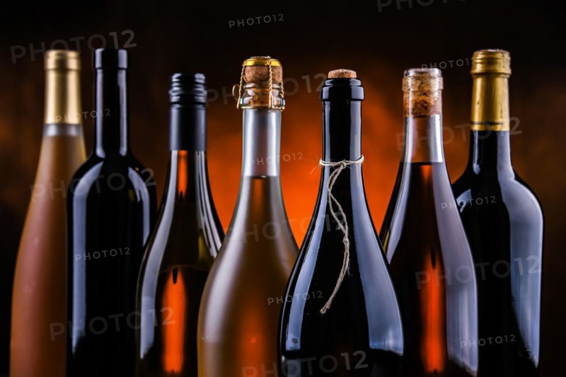 Composition with bottles of different sorts of wine