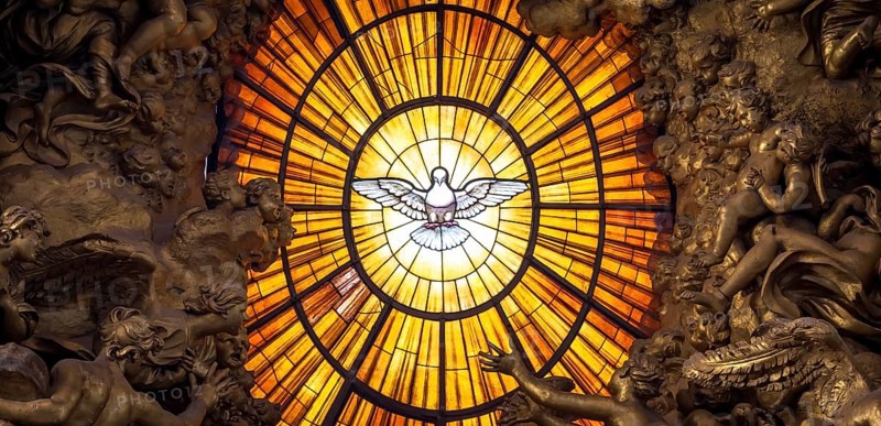 ROME, ITALY - AUGUST 24, 2018: Throne Bernini Holy Spirit Dove Saint Peters Basilica Vatican Rome Italy. Bernini created Saint Peters Throne with Holy Spirit Dove Stained Glass Amber in 1600s