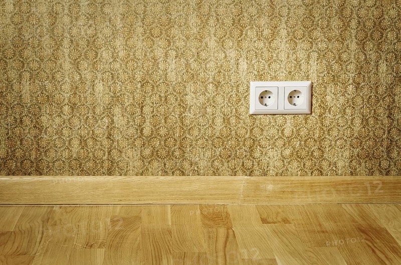 Double Socket In The Wall Of An Empty Room