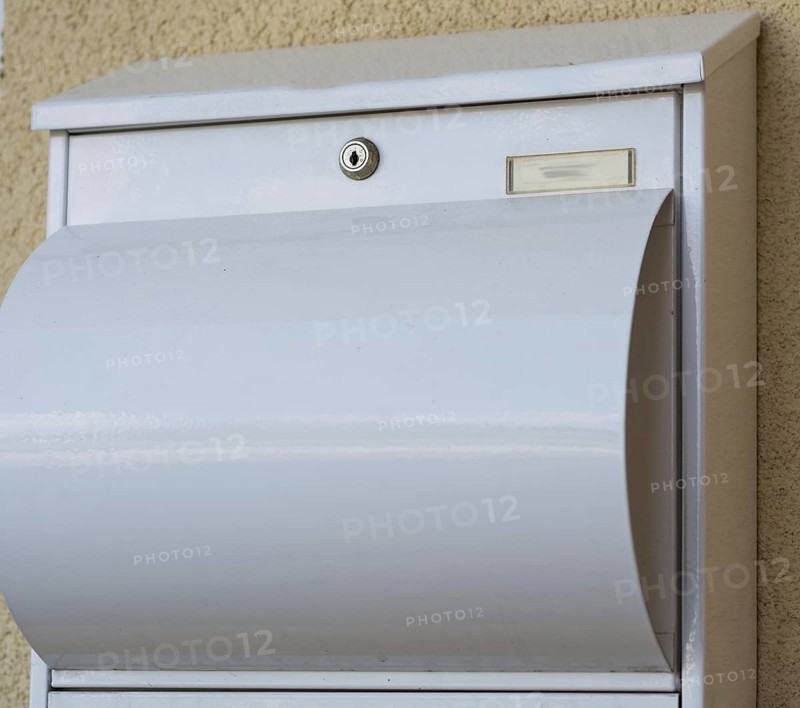 Modern white metal post box, Austria