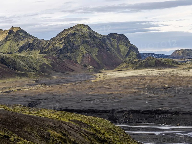 Moss-covered volcanic mountain landscape, Pakgil, Iceland