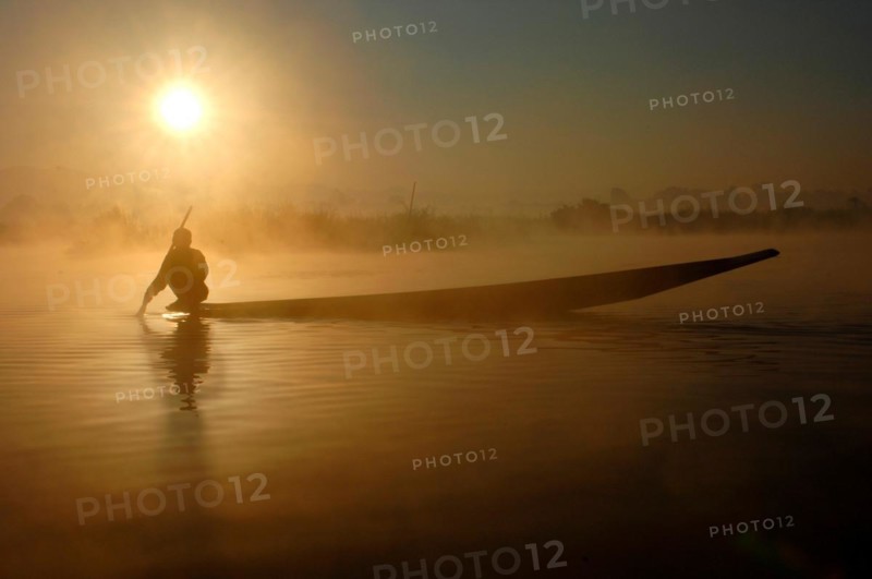 Myanmar, Fisherman with boat at Inle Lake, Myanmar